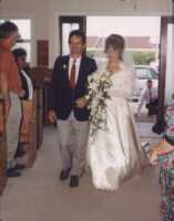 Dad (Ralph Smith) leads Debbie down the aisle